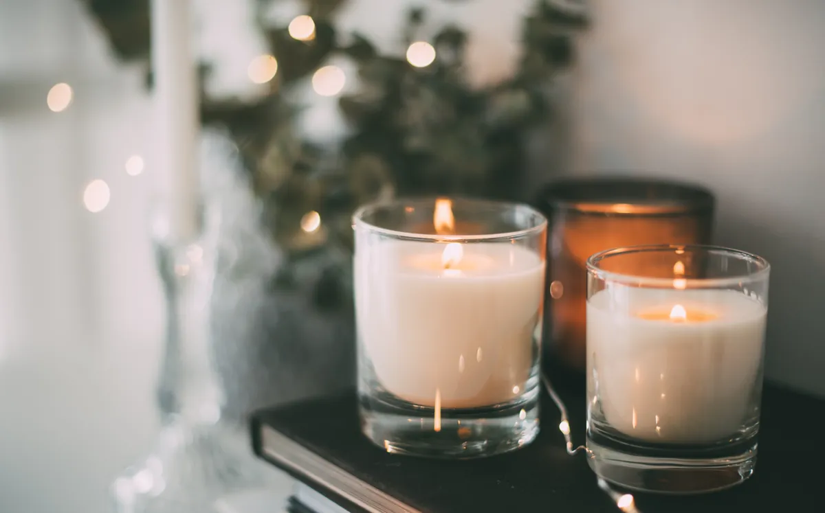 Sampler bundle and gift-ready candle and soap products arranged for customers trying the brand.