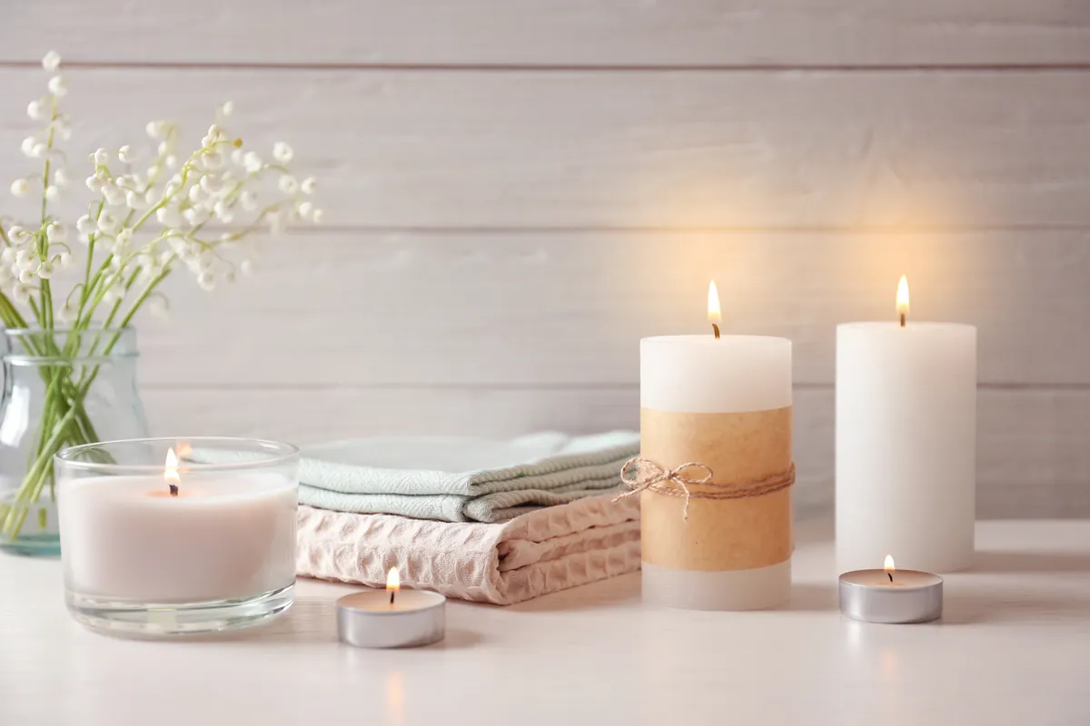 Warm seasonal candle display showing premium presentation and consistent small-batch quality.