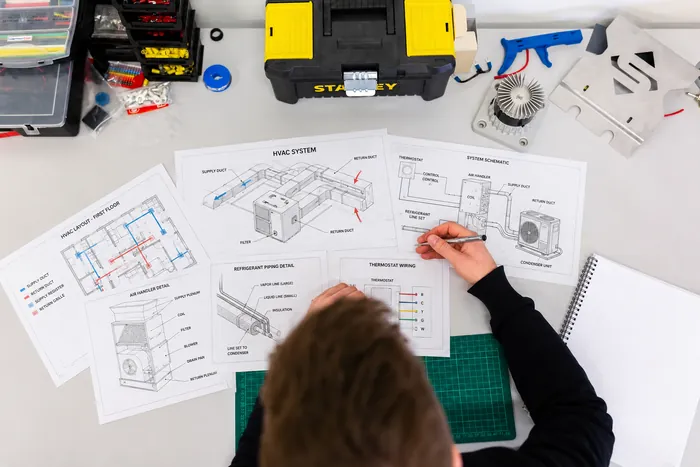 Professional technician reviewing service details and equipment performance