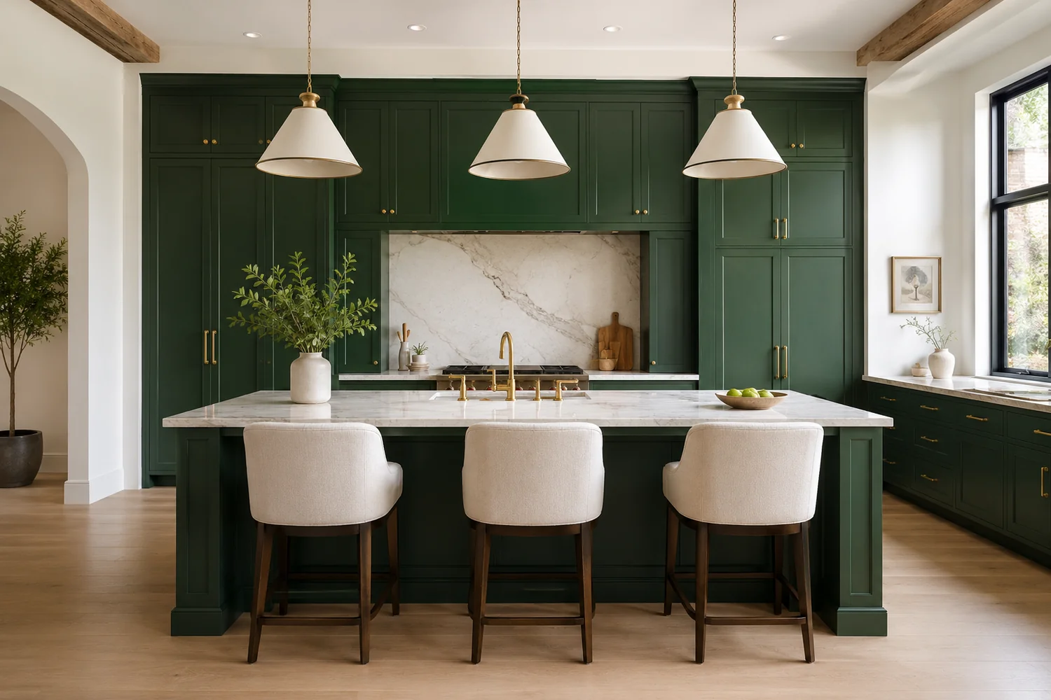 Custom green kitchen with coordinated cabinetry, stone, lighting, and furnishings
