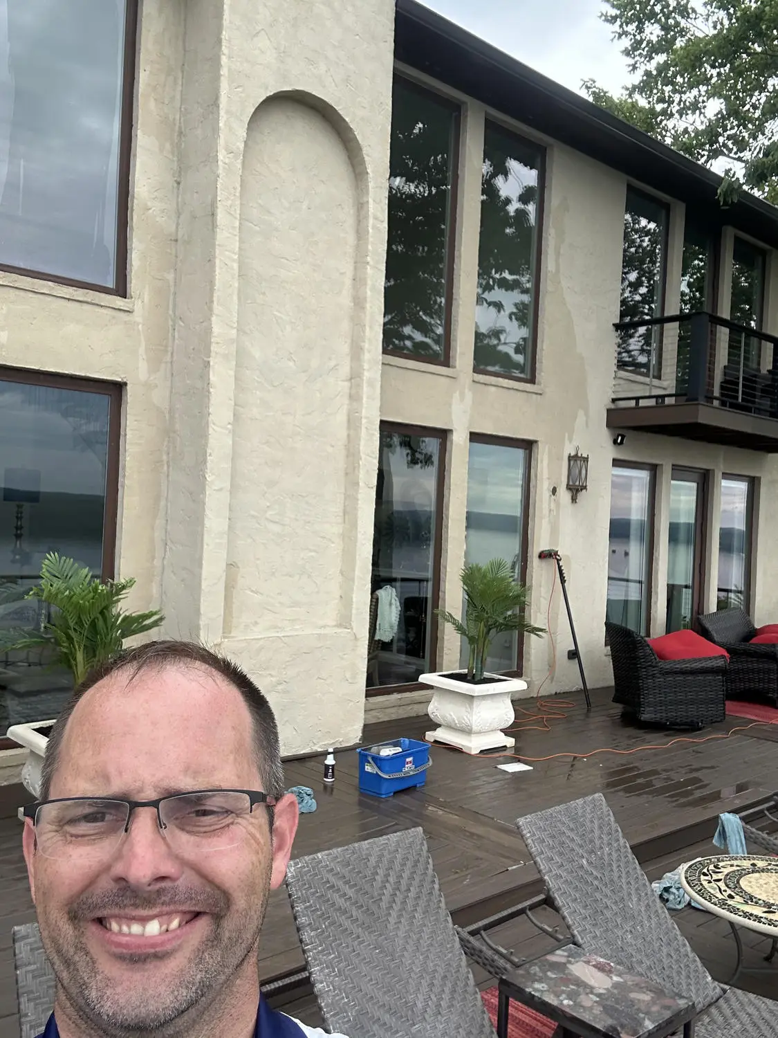 Craig working at a large lakefront residence