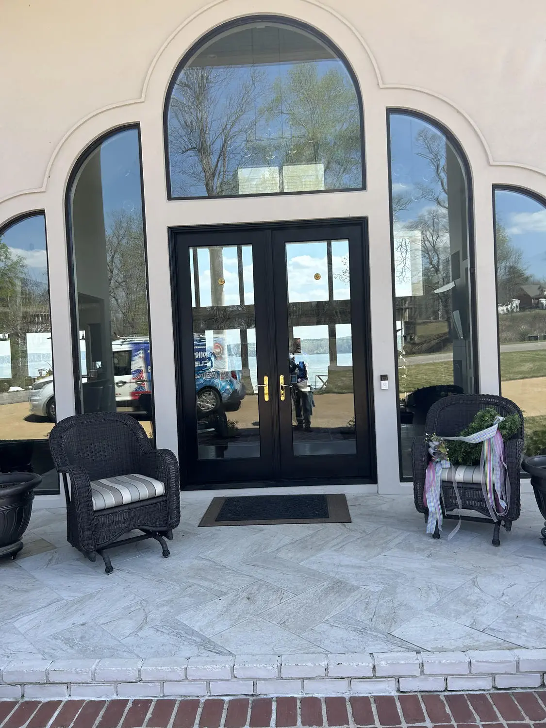 Clean arched exterior windows at a luxury residence