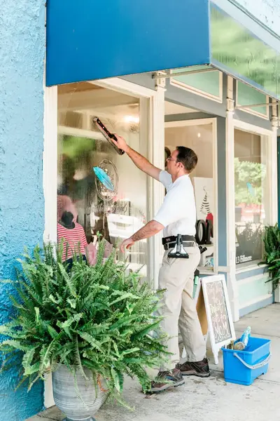 Craig cleaning a storefront