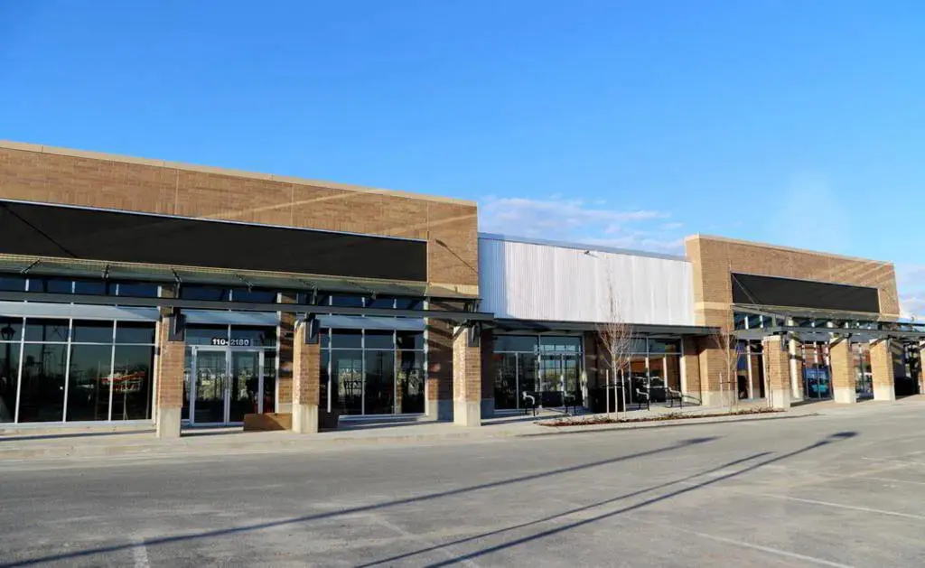 Modern shopping center with several commercial storefronts