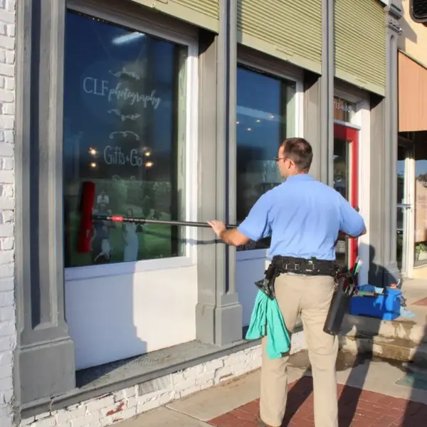 Craig cleaning a local storefront